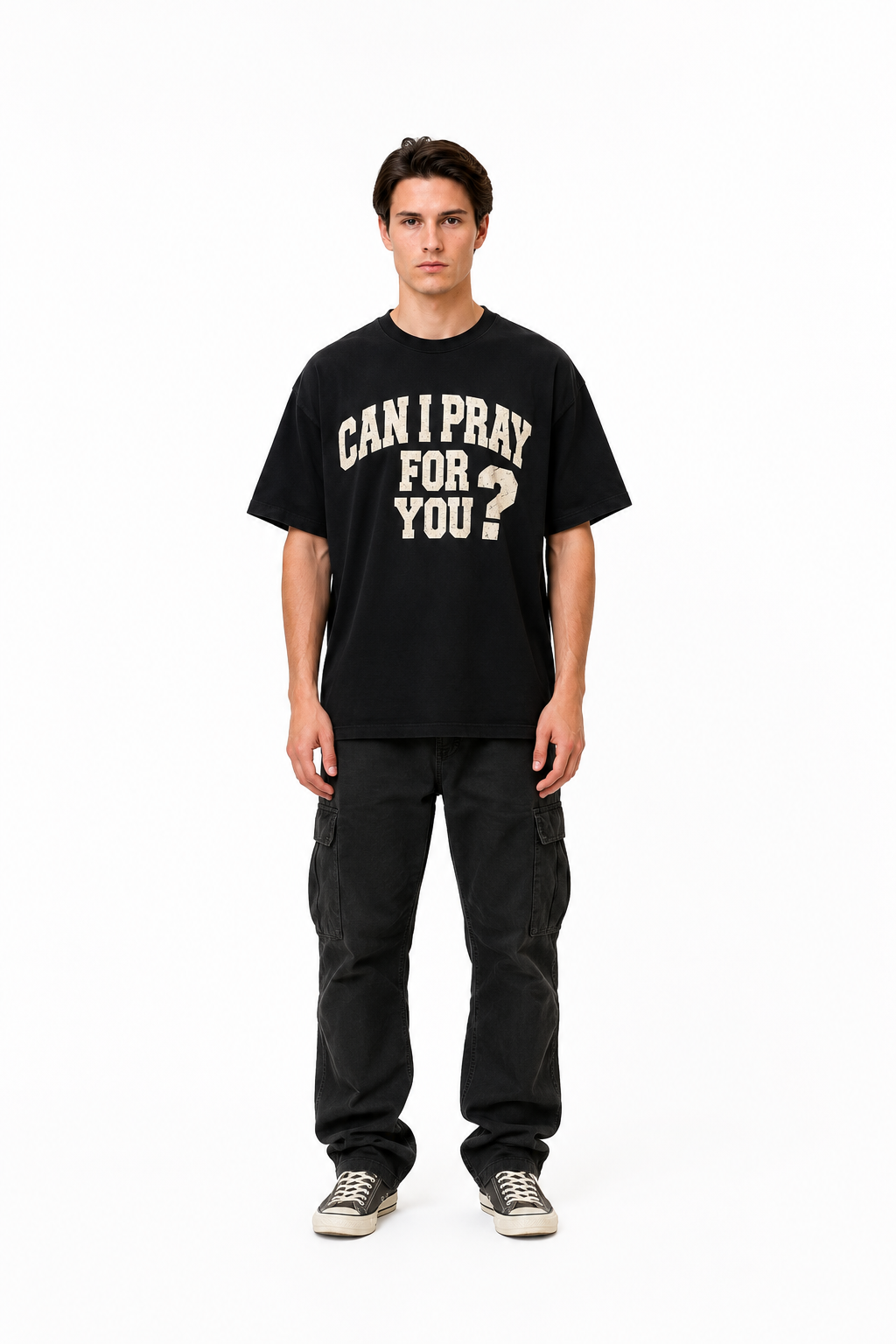 Person wearing a black t-shirt with text on a white background
